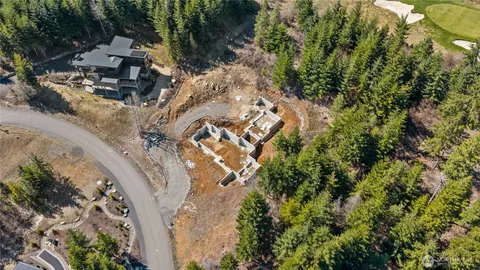 an aerial view of residential house with outdoor space