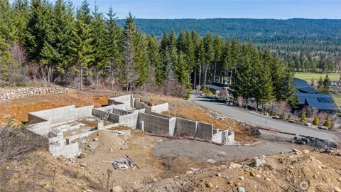 an aerial view of a backyard with outdoor space