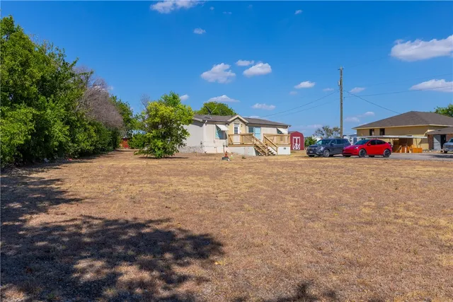 a view of a road with a building