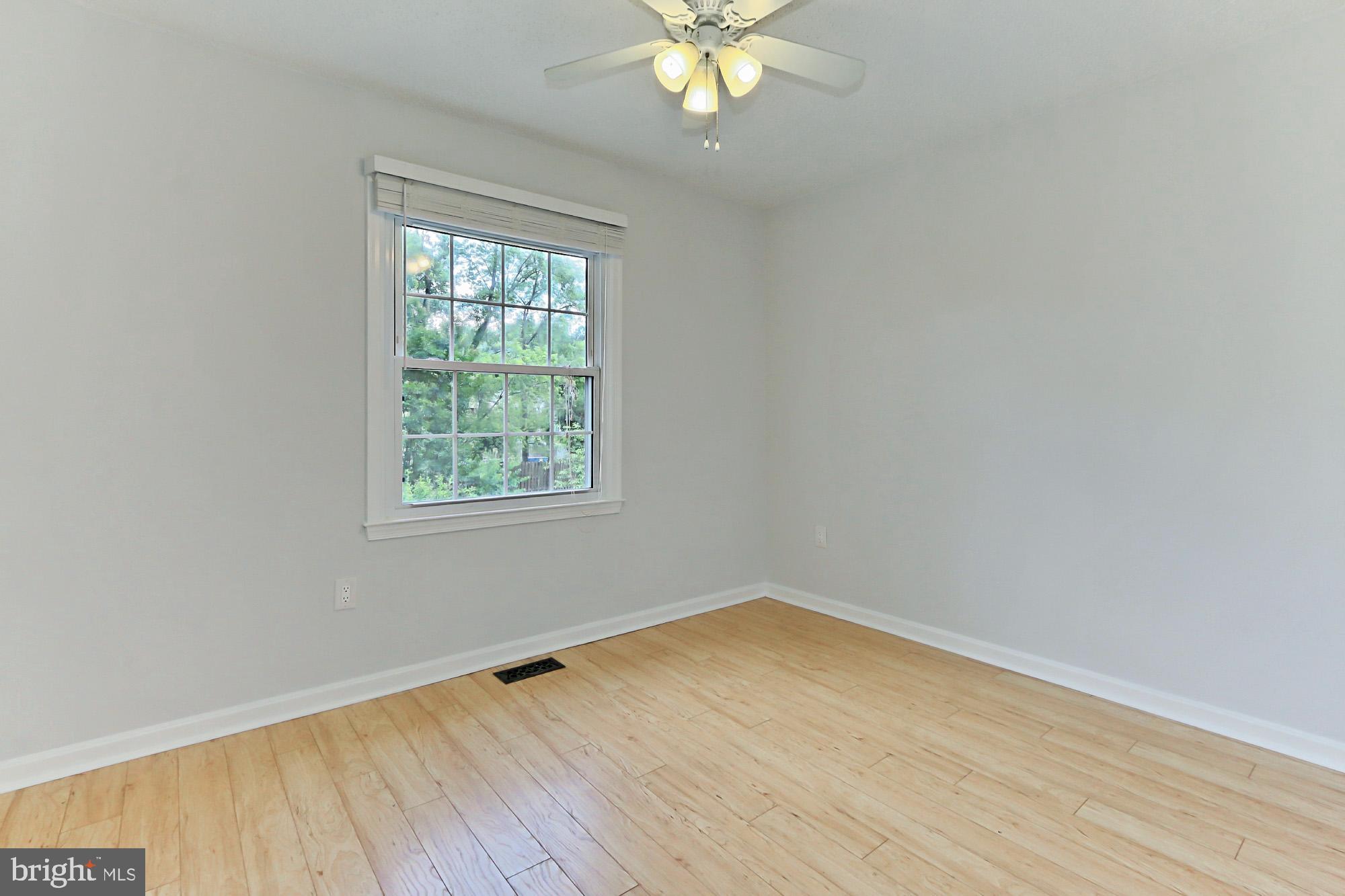 7112 Whetstone Road Alexandria, VA 22306 - Photo 17 of 30 Bright BR with ceiling fan and Pergo XP wood floor