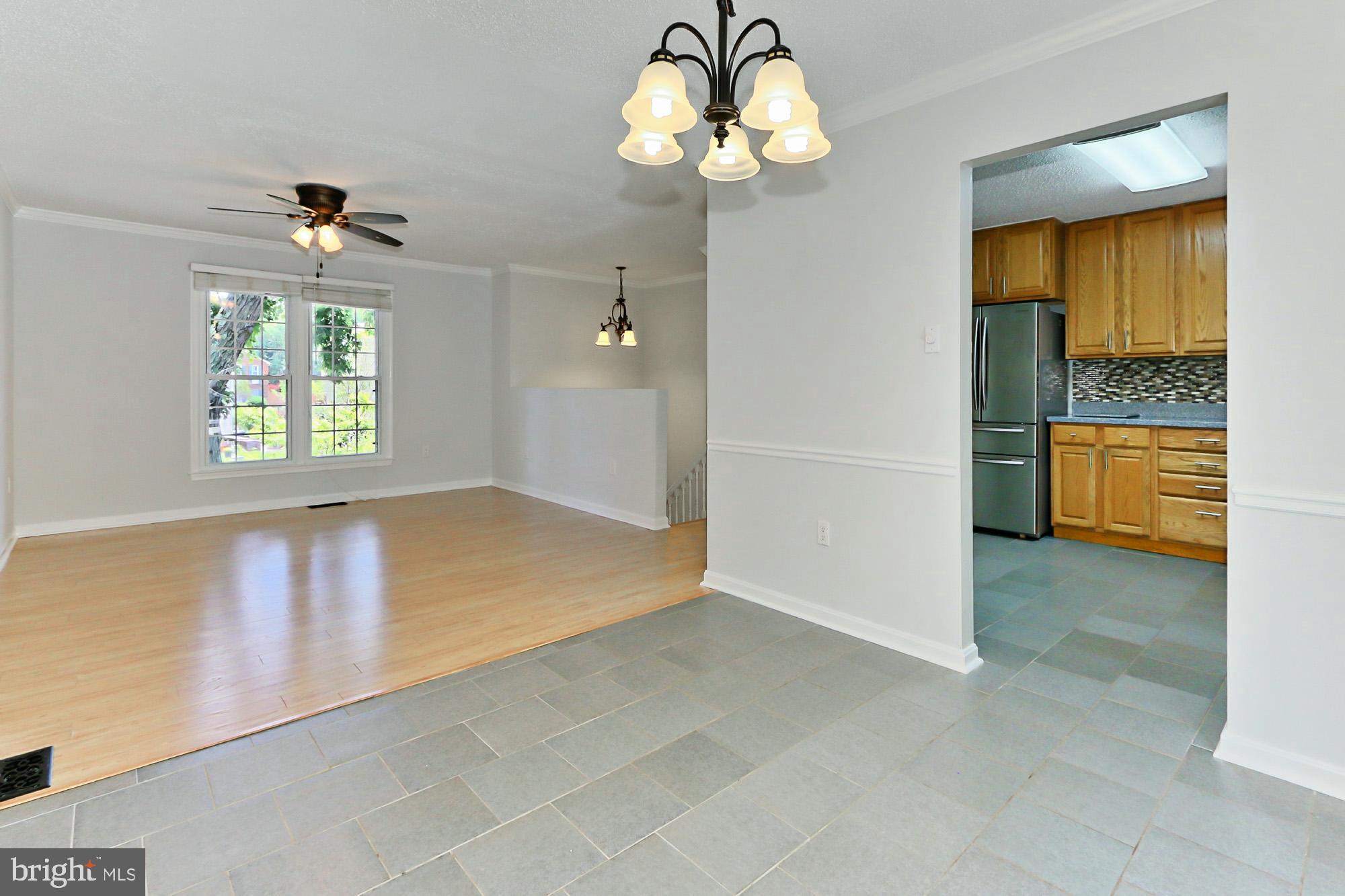 7112 Whetstone Road Alexandria, VA 22306 - Photo 8 of 30 Dining Room is open to the kitchen and Living Room