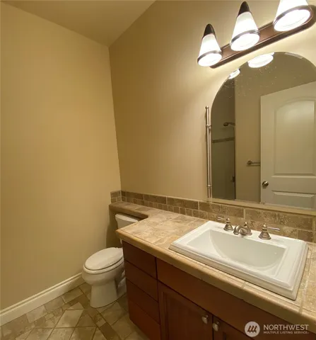 a bathroom with a sink and a toilet