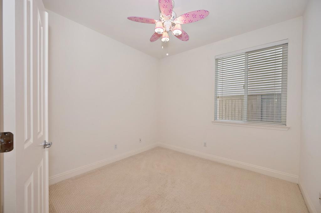 3930 Riley Anton Way Rancho Cordova, CA 95742 - Photo 27 of 45 an empty room with a window and a fan