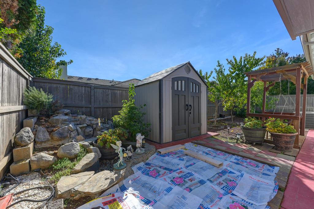 3930 Riley Anton Way Rancho Cordova, CA 95742 - Photo 42 of 45 a backyard of a house with lots of green space