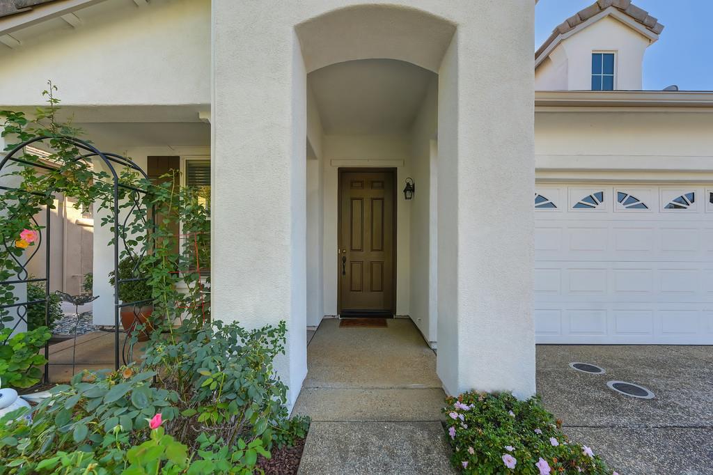3930 Riley Anton Way Rancho Cordova, CA 95742 - Photo 5 of 45 front view of a house with a potted plant