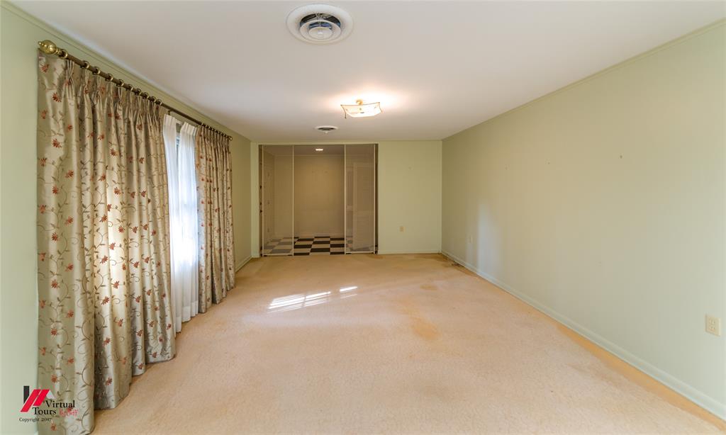 205 7th Street Northeast Springhill, LA 71075 - Photo 17 of 40 Recessed ceiling fixture, flush-mount ceiling light, wall-to-wall carpeting, checkered flooring, full-height sliding mirrored doors
