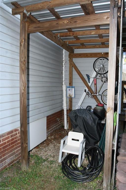 409 Moser Street Graham, NC 27253 - Photo 6 of 18 Covered Storage Area