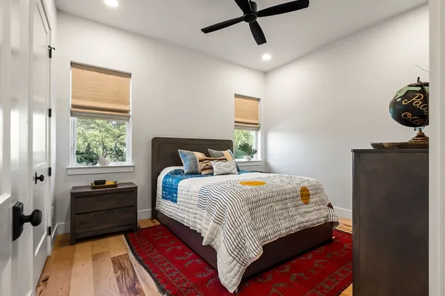 a view of a porch with furniture and garden