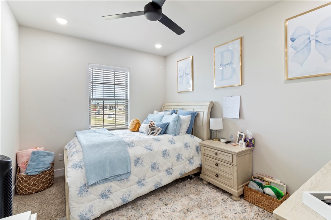 4078 Gunner Trail College Station, TX 77845 - Photo 20 of 33 a bedroom with a bed and a window