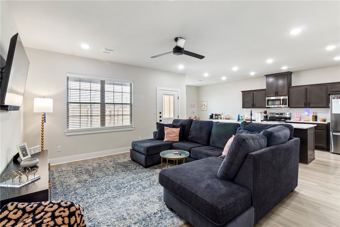 4078 Gunner Trail College Station, TX 77845 - Photo 3 of 33 a living room with furniture kitchen and a window