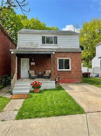 a front view of a house with patio