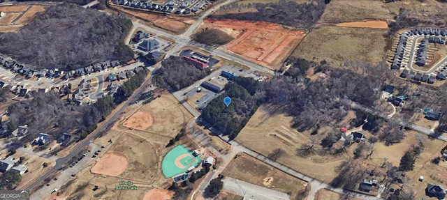 a view of a house with swimming pool