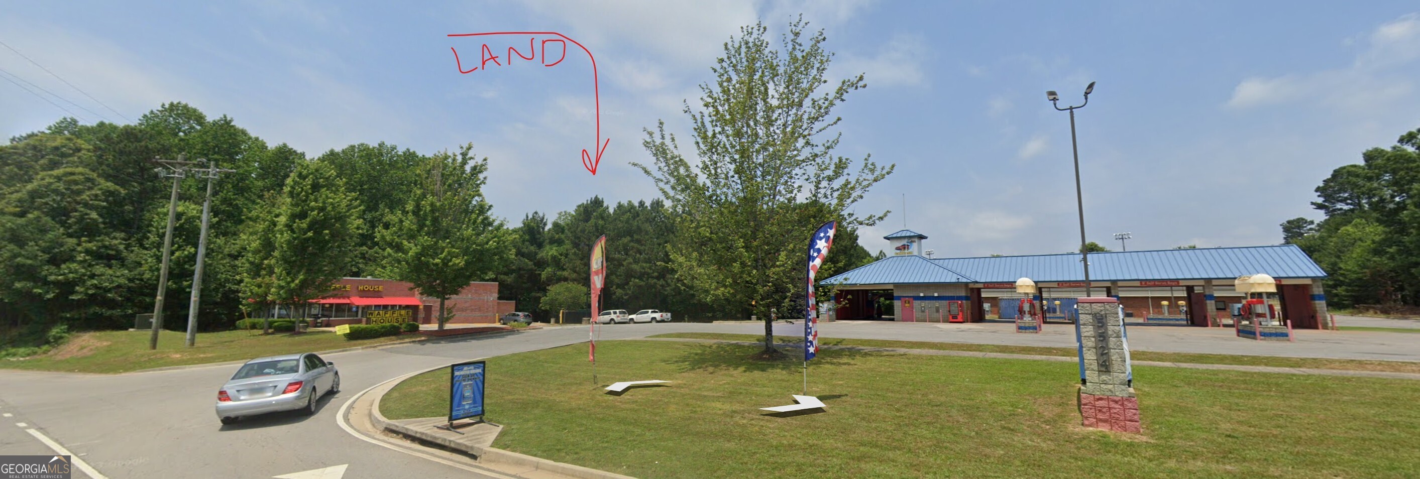 5531 Radford Road Flowery Branch, GA 30542 - Photo 32 of 33 a view of a house with swimming pool