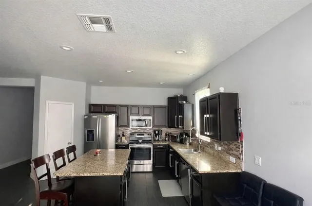 a house view with a garden space