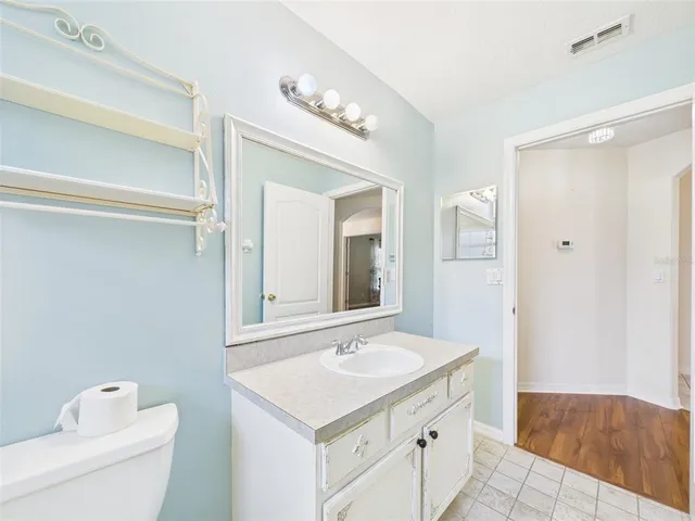 a view of a house with porch and wooden floor