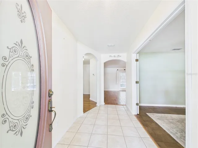 a kitchen with a sink stove top oven and cabinets