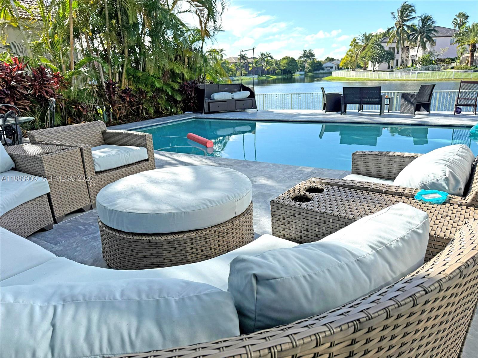 18560 Southwest 44th Street Miramar, FL 33029 - Photo 12 of 16 a view of house with outdoor seating