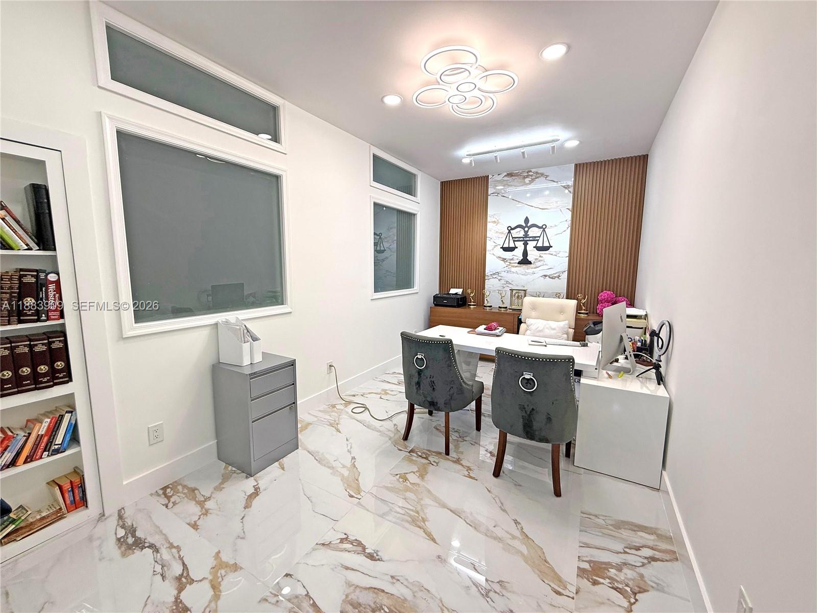 18560 Southwest 44th Street Miramar, FL 33029 - Photo 3 of 16 a living room with furniture and a flat screen tv