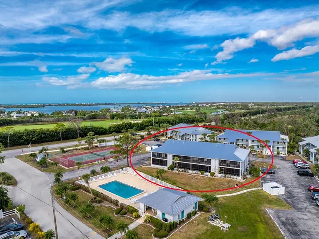 a view of a city with lawn chairs