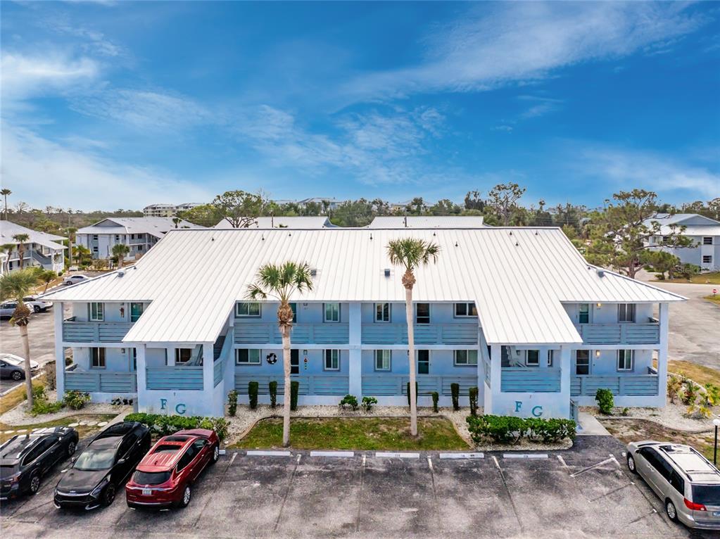 6800 Placida Road, Unit 228 Englewood, FL 34224 - Photo 2 of 45 a view of multiple houses with a street