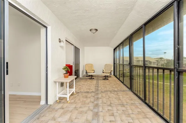 a view of a large window with an outdoor space