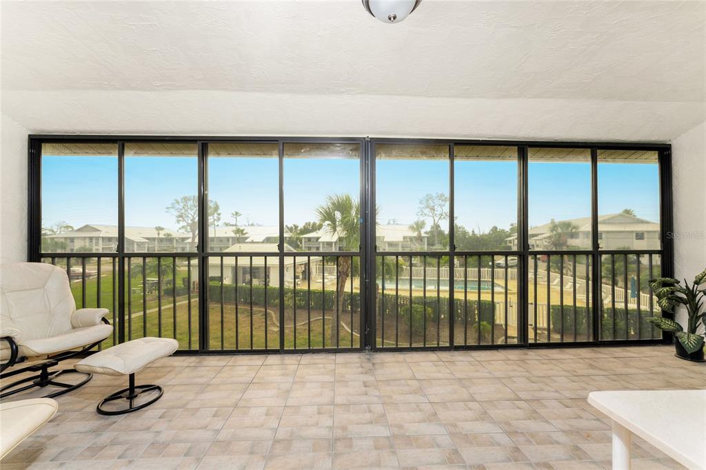 6800 Placida Road, Unit 228 Englewood, FL 34224 - Photo 29 of 45 a view of a large window with an outdoor space