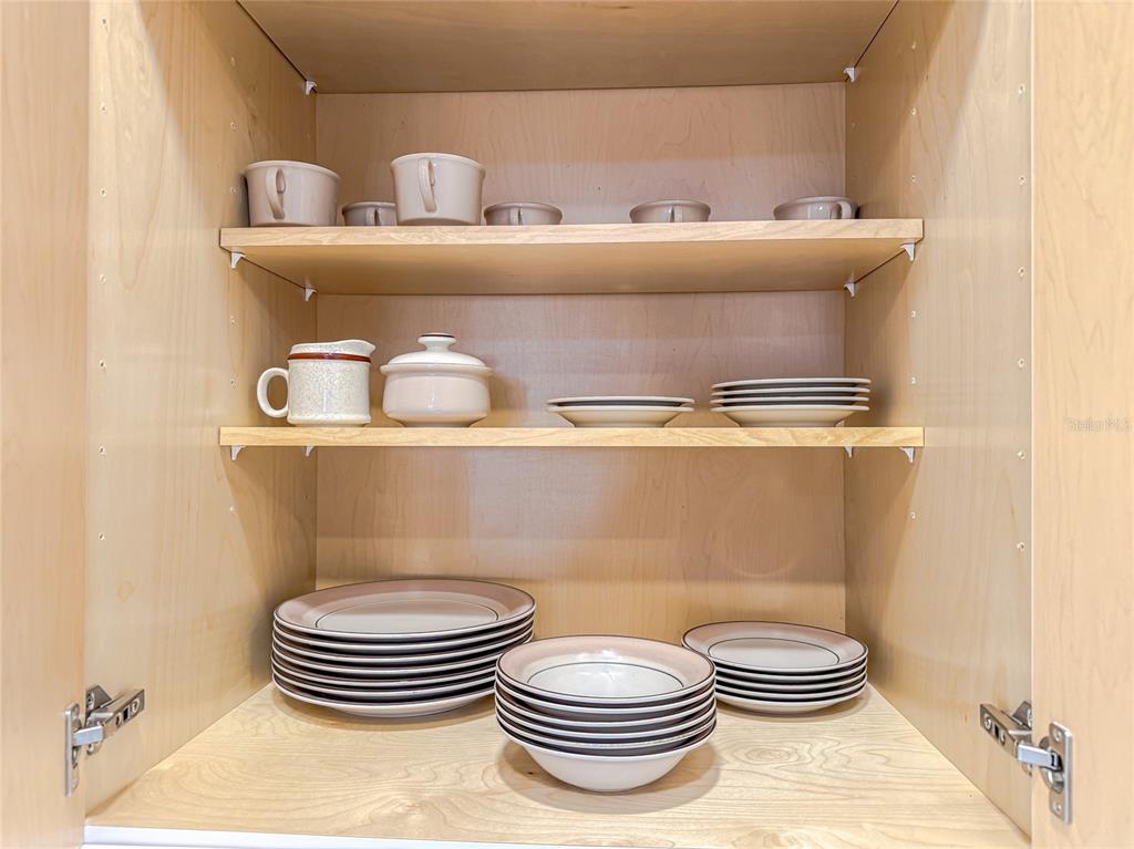 6800 Placida Road, Unit 228 Englewood, FL 34224 - Photo 31 of 45 a bathroom with a toilet a sink and a mirror