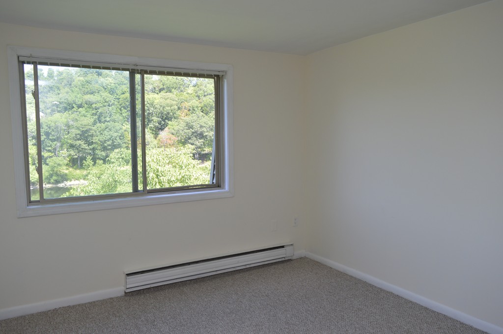222 Stackpole Street, Unit 15 Lowell, MA 01852 - Photo 14 of 16 an empty room with a window