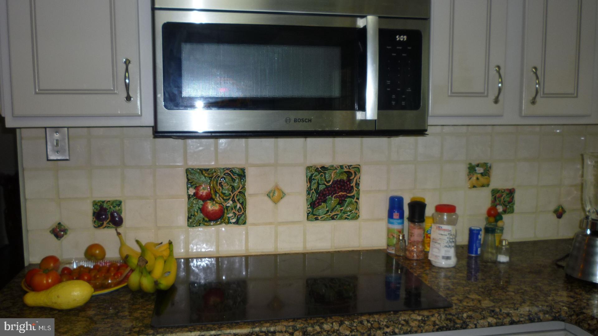 17300 Twin Ridge Court Silver Spring, MD 20905 - Photo 20 of 57 Built in Microwave Oven Above Cook Top