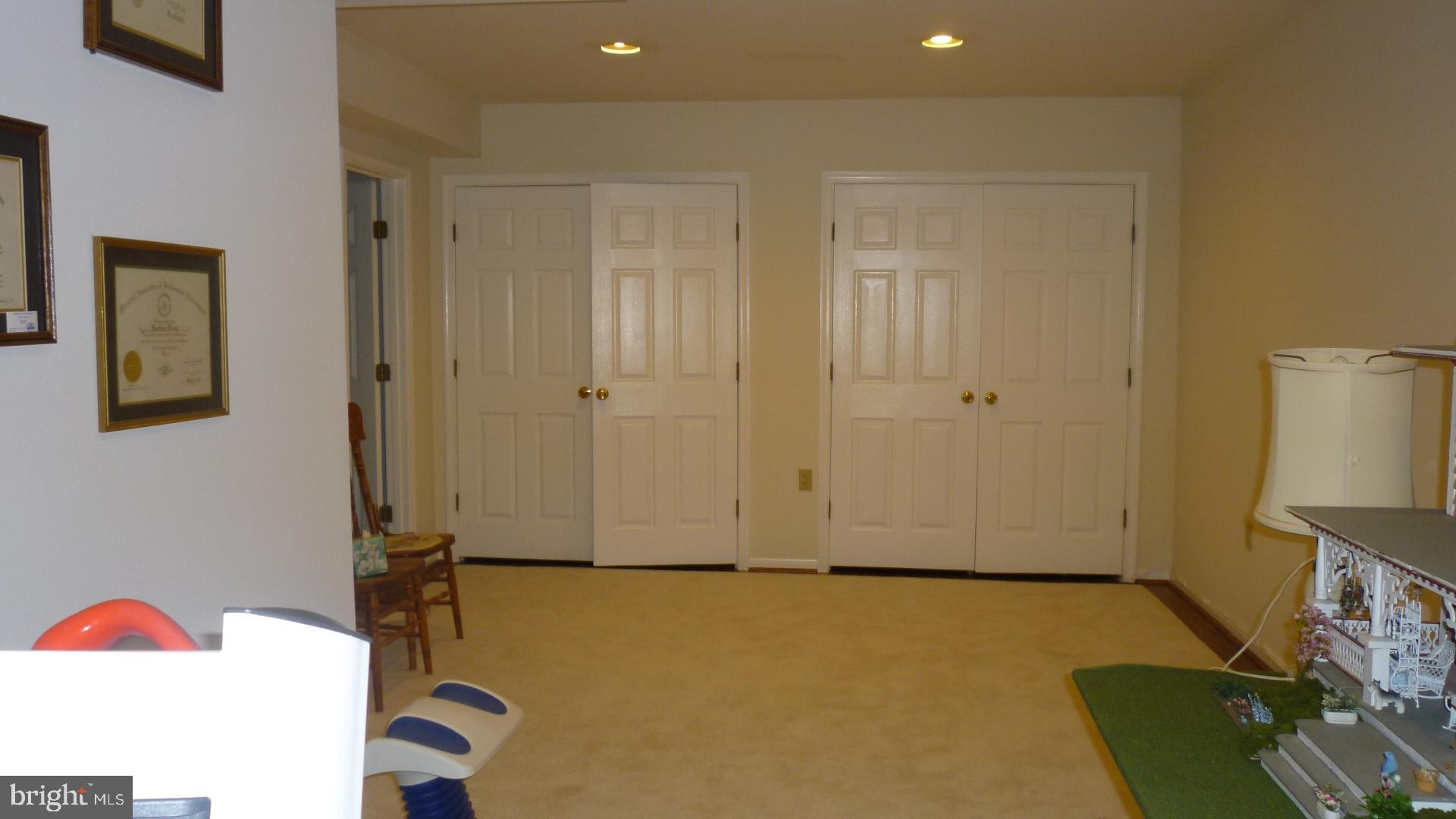 17300 Twin Ridge Court Silver Spring, MD 20905 - Photo 37 of 57 Exercise Room in Basement with More Storage
