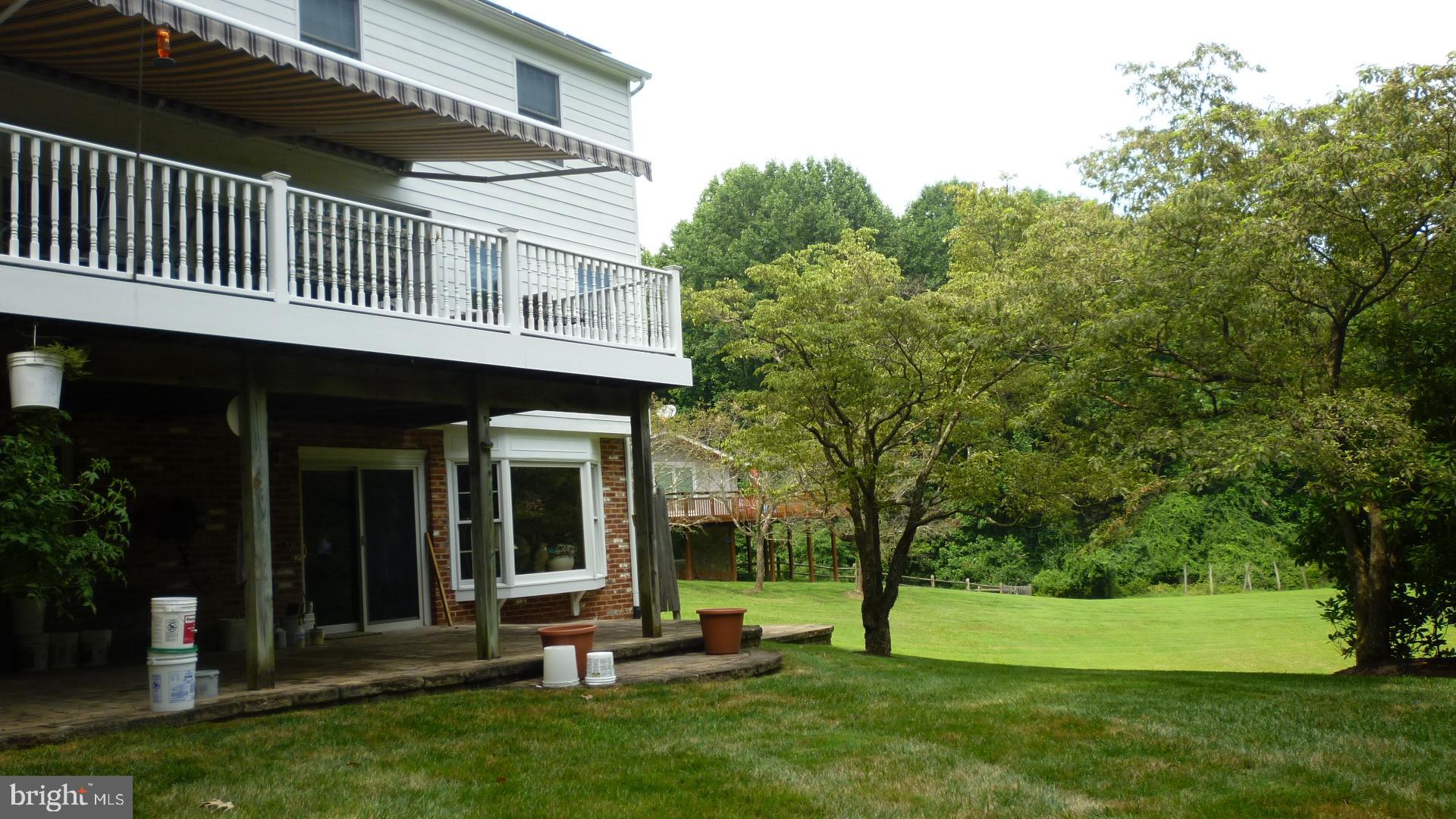 17300 Twin Ridge Court Silver Spring, MD 20905 - Photo 5 of 57 Retractable Awning above the deck