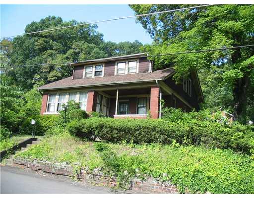 239 Emerson Road Pittsburgh, PA 15209 - Photo 2 of 10 Exterior Front. Home on Large Corner Lot