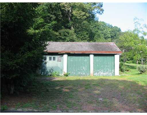 239 Emerson Road Pittsburgh, PA 15209 - Photo 10 of 10 Parking Lot/Garage. Three Bay Det/GRG. ALSO NEEDS WORK.