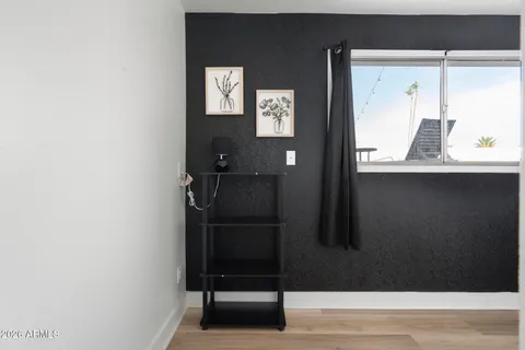 a view of a house with swimming pool and sitting area