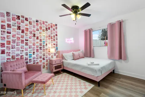 a view of a swimming pool with lounge chairs