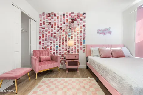 a view of a swimming pool with an outdoor space and seating area