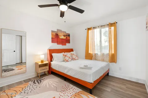 a view of a patio with couches and potted plants