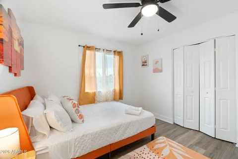 a view of a swimming pool with a yard