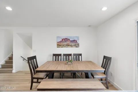 a kitchen with a sink a stove and cabinets