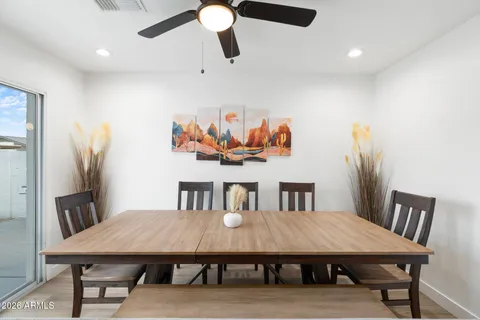 a bathroom with a sink double vanity granite and a mirror