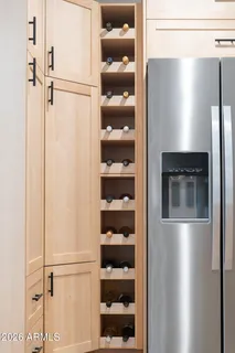 a bathroom with a sink and mirror