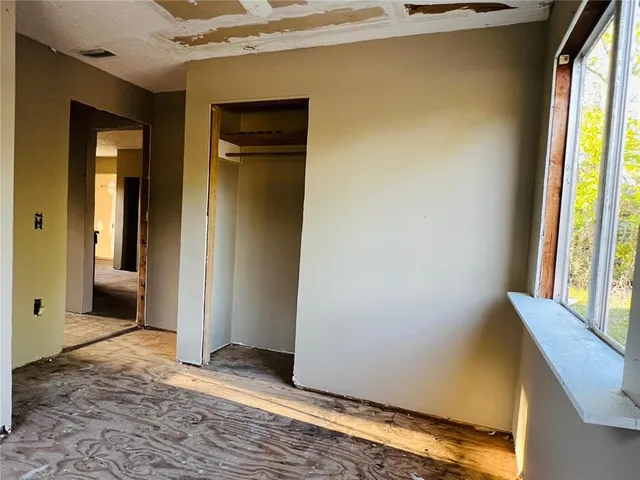 a view of an empty room and window