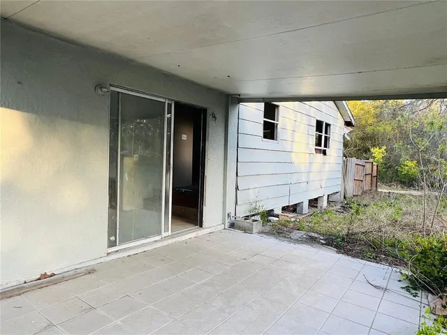 a view of backyard with green space