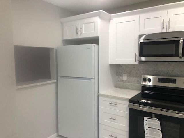 21913 Lake Forest Circle, Unit 201 Boca Raton, FL 33433 - Photo 7 of 16 the kitchen 3
