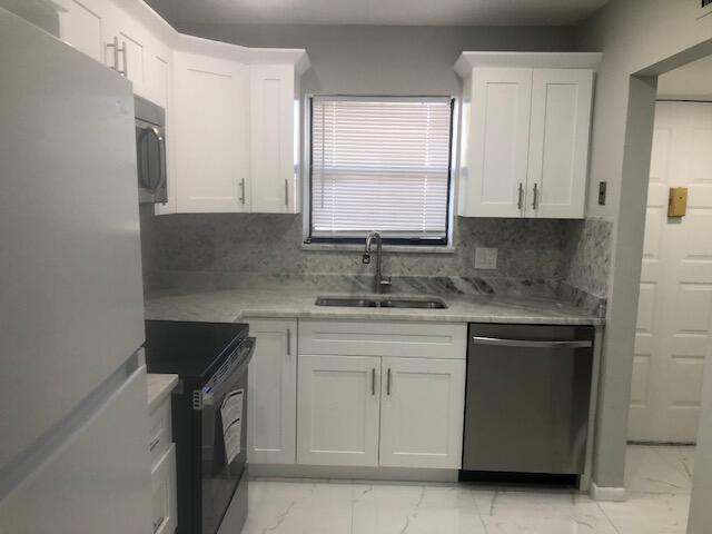 21913 Lake Forest Circle, Unit 201 Boca Raton, FL 33433 - Photo 8 of 16 the kitchen 4