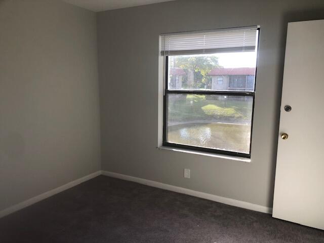 21913 Lake Forest Circle, Unit 201 Boca Raton, FL 33433 - Photo 10 of 16 the master bedroom 2