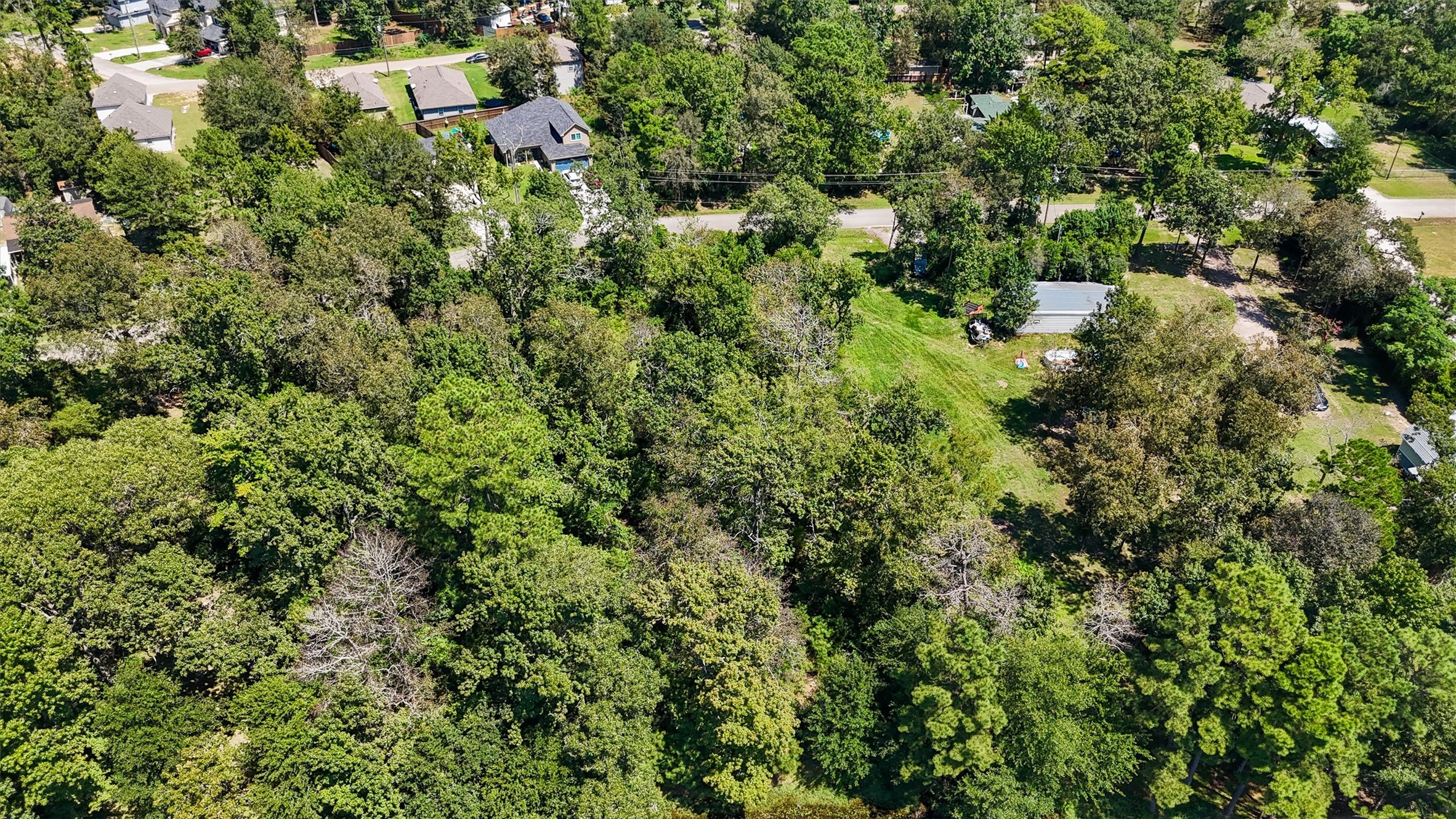 3816 Sam Houston Road Houston, TX 77002 - Photo 5 of 19 an aerial view of residential house with outdoor space and trees