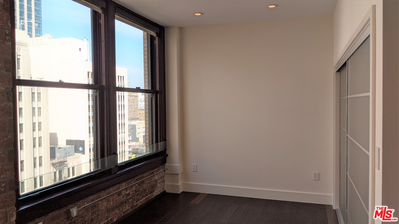 460 South Spring Street, Unit 1005 Los Angeles, CA 90013 - Photo 21 of 46 a view of room with window