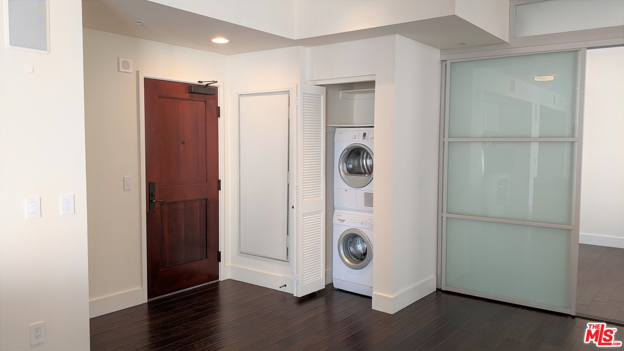 460 South Spring Street, Unit 1005 Los Angeles, CA 90013 - Photo 4 of 46 a view of a storage & utility room with a door