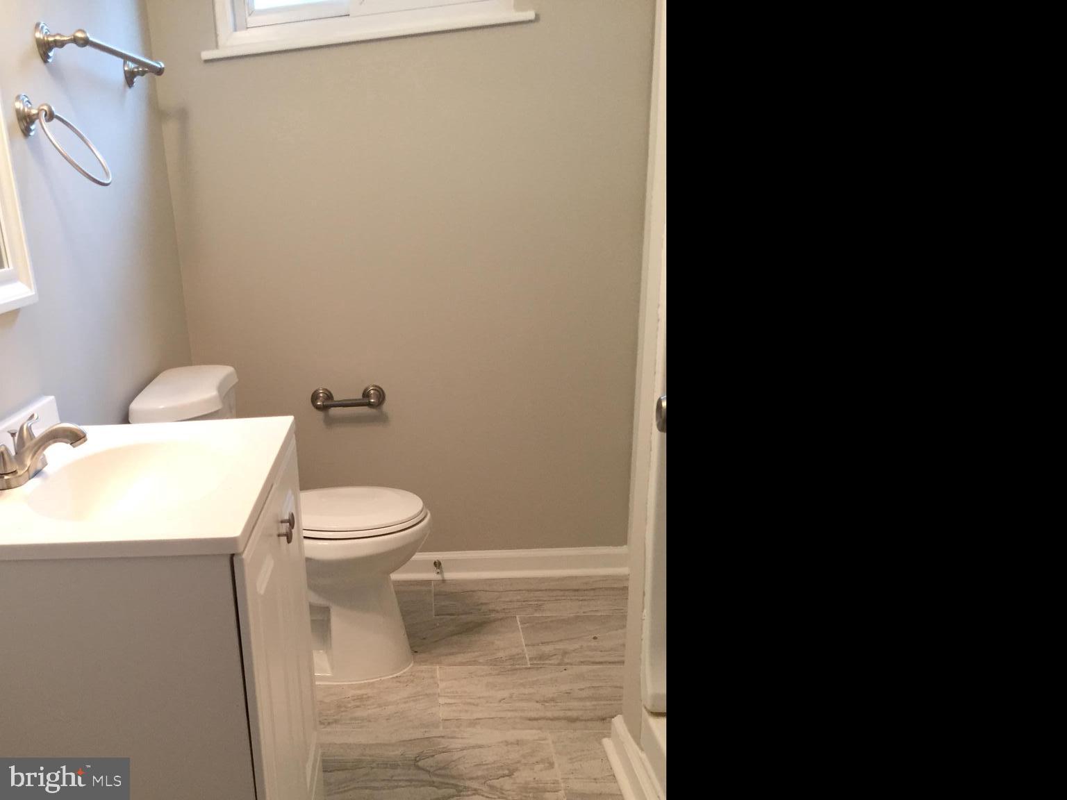 4915 Taft Road Temple Hills, MD 20748 - Photo 13 of 32 Updated Bath Vanity/Toilet
